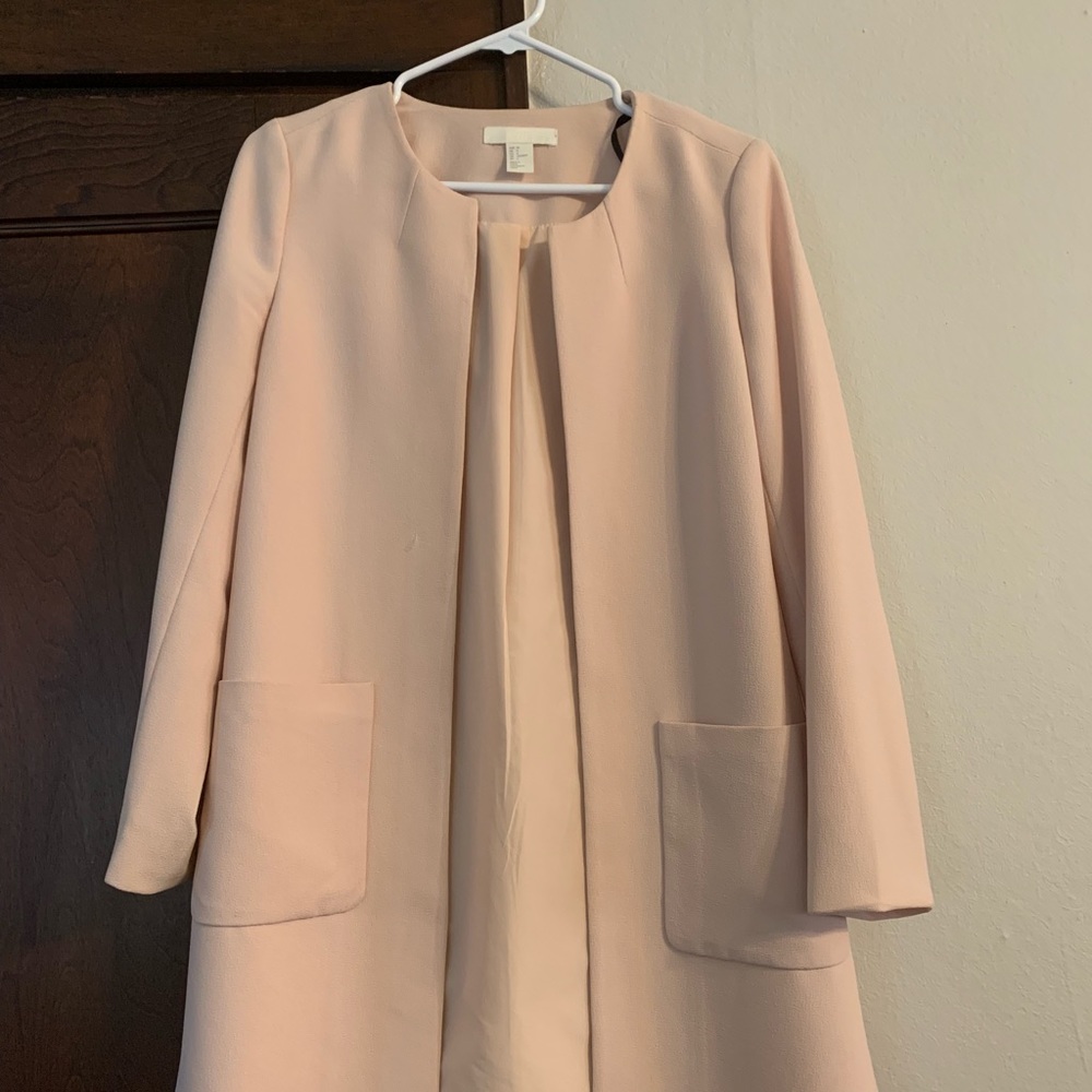 H&M long, light-pink jacket.